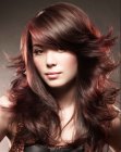 Long brown hair with layers and outward flips