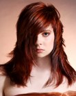 Lively long red hair with thick layers