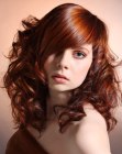 Long hairstyle with sleek tapered bangs and curls
