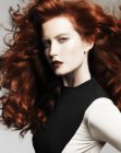 Long red hair with curls and extreme volume