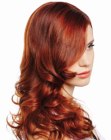 Long red hair with curls and waves