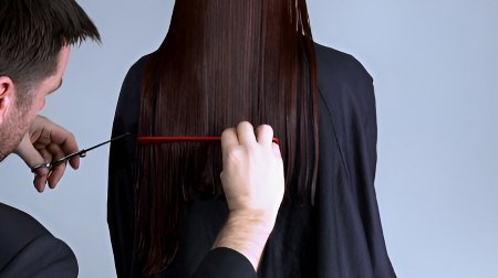 Long classical one length haircut, creating a blanket of 
