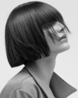 Blunt-cut bob with bangs that cover the eyebrows