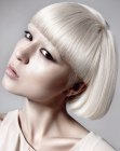 white hair cut into a bob