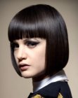 smooth chin length bob with a blunt fringe