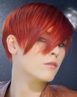 pixie with finely layered red hair
