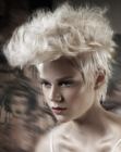pixie hairstyle with a curly top