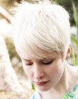 bleached blonde hair in a pixie