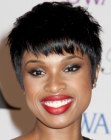 Jennifer Hudson with her black hair in a pixie