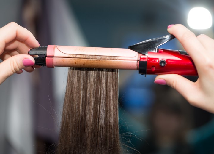 Curling hair with an iron