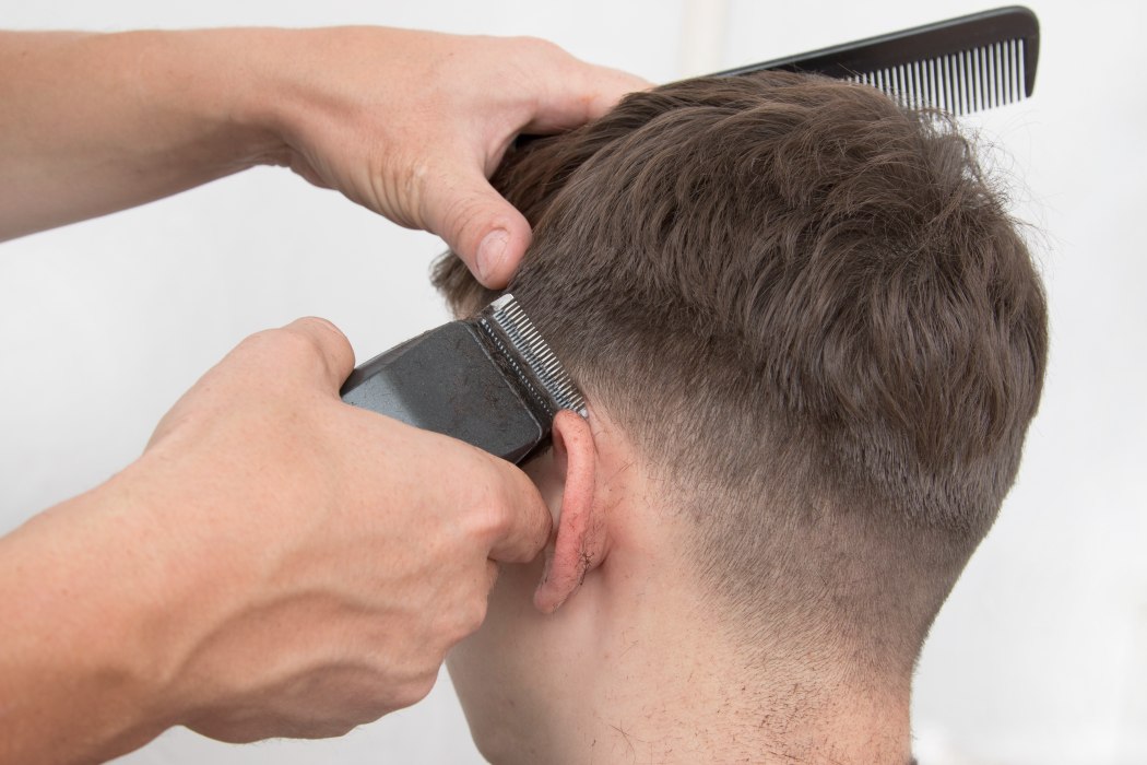 cutting hair with clippers fade