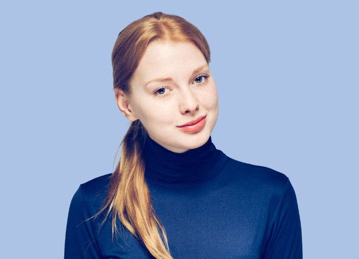 Woman with fine hair who is wearing a silky turtleneck