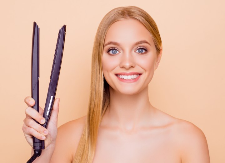 Woman with flat iron