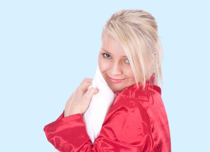 Girl wearing red satin pyjamas