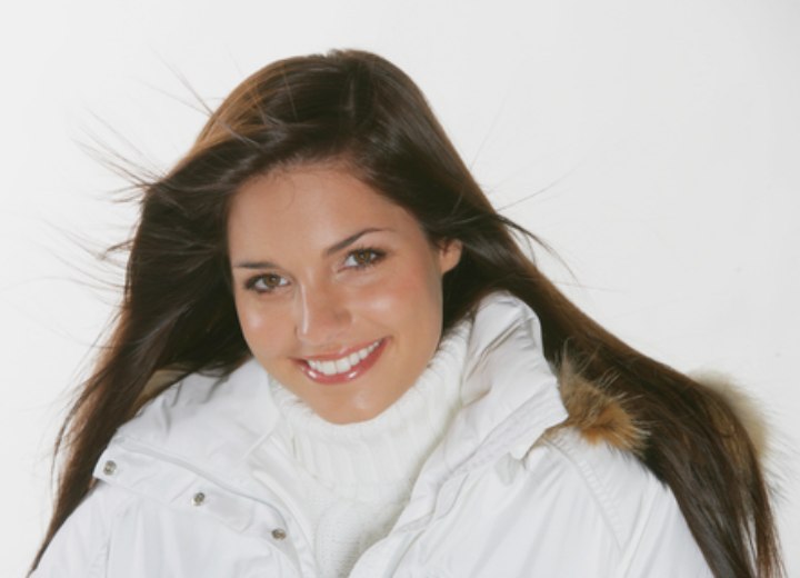 Young woman with long hair wearing winter clothes