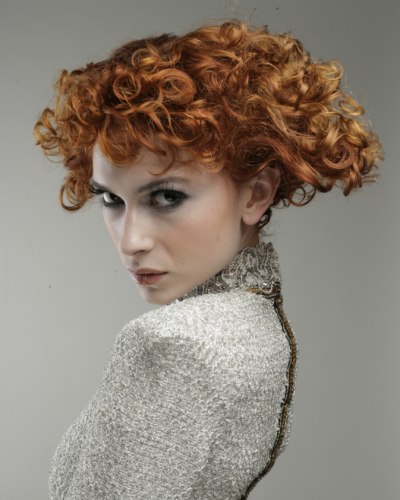 Short hairstyle with curls and extreme graduation