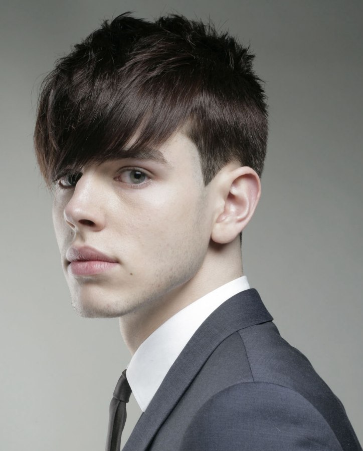 Classic young men's hairstyle with clean lines and the hair cut around