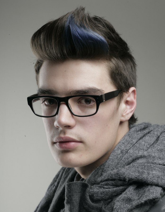 retro men's hairstyle with a flip up and blue streaks