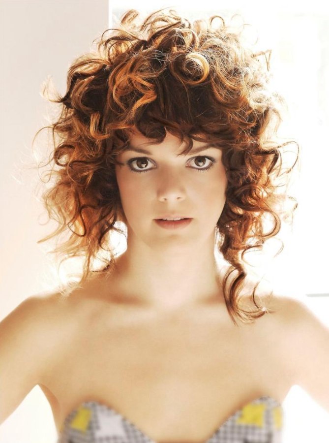 Asymmetrical curly hair  with round curls and spiraled curls