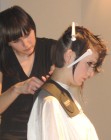 cutting a bob at a hair show