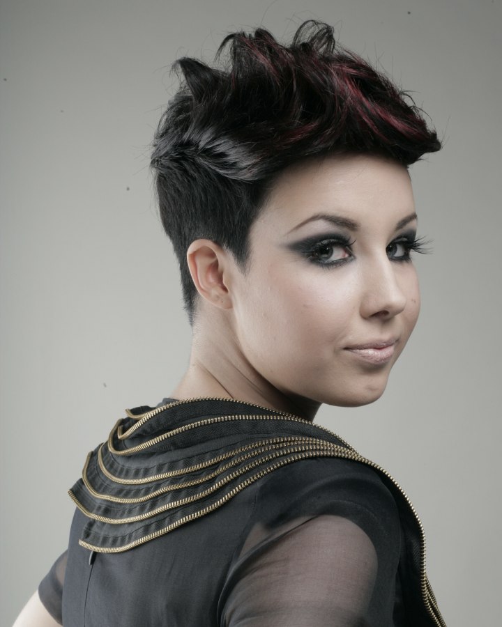 Pixie haircut with a tight shingle around the nape area Pixie haircut with a tight shingle around the nape area