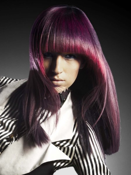 Long blunt cut hair with shine and a violet color