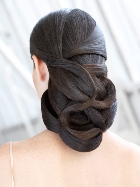 Brunette updo with wrapped strands of hair