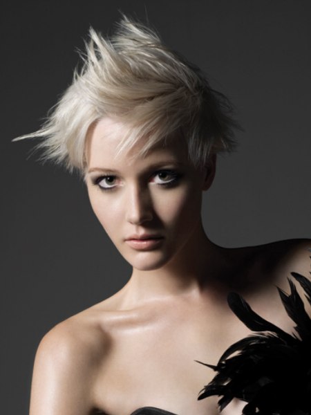 Short blonde festive haircut with punky spikes