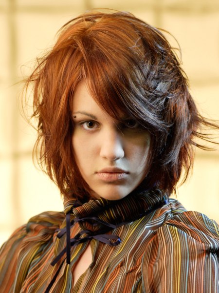 Auburn red hair in a soft medium length style