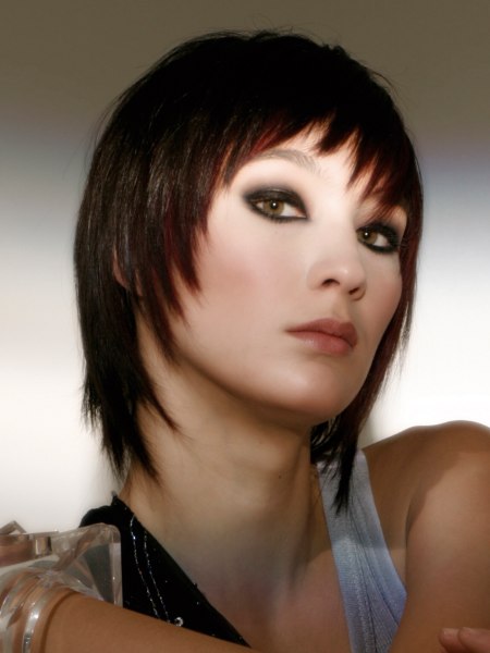 Brown medium-length tapered hair that frames the face