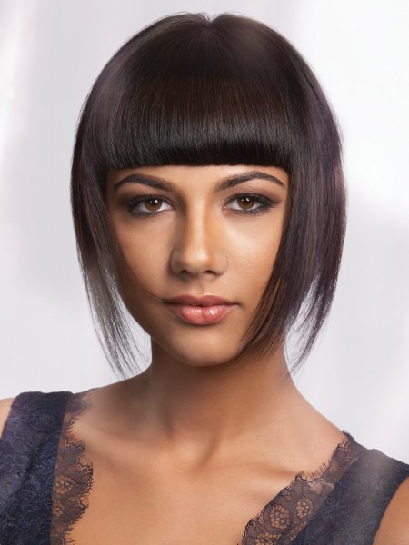Short and feathery hair with a fringe