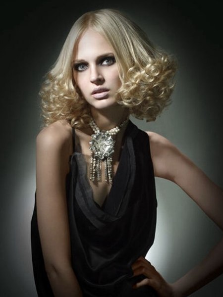 Medium long flaxen blonde hair with glossy curls