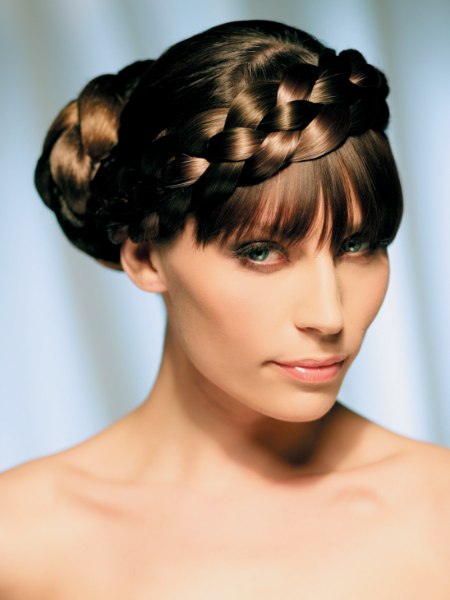 Braided hairstyle created with a hairpiece