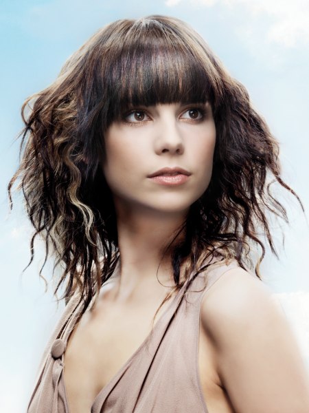 Hair with natural movement and a sharp fringe