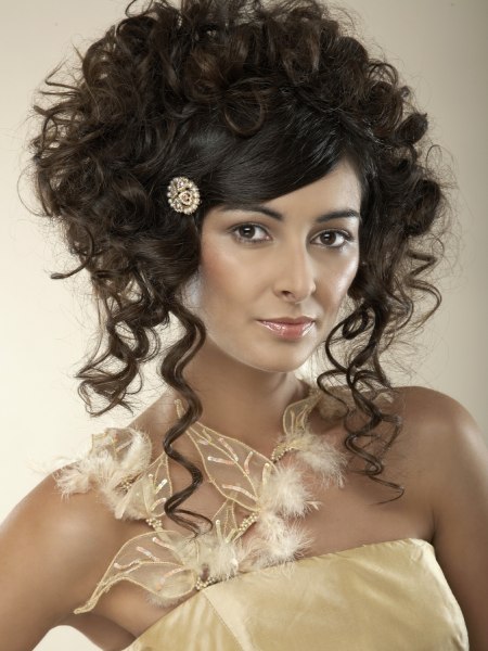 Bridal hairstyle with high-volume curls and ringlets