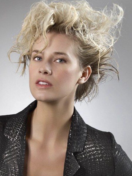 Short blonde hair styled with gelled sections
