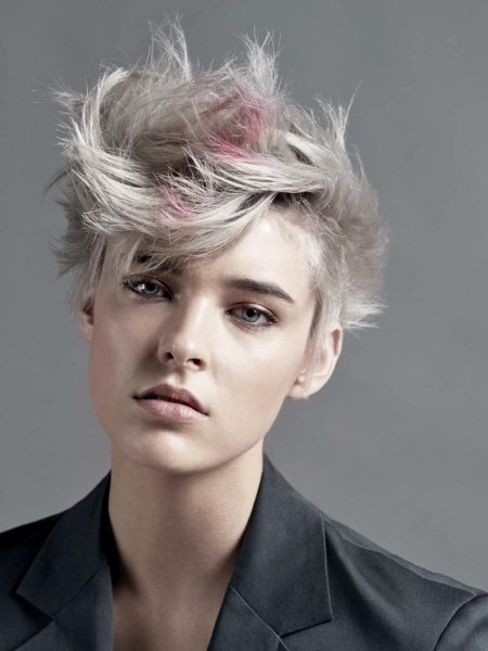 Short silver hair with a pink hair chalk color accent
