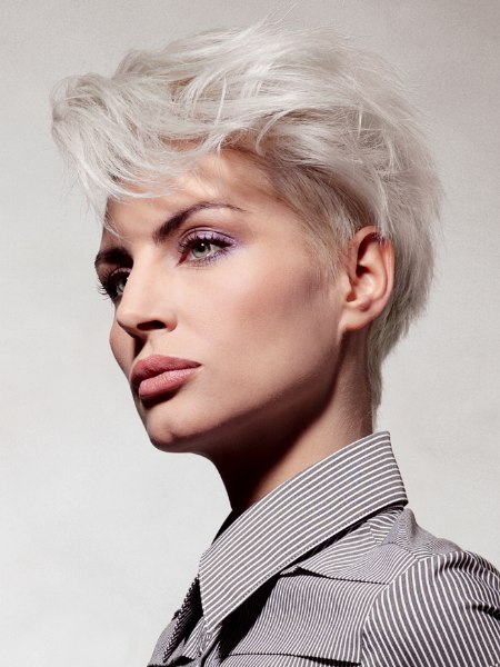 Short haircut with a steeply tapered neckline for baby fine gray hair