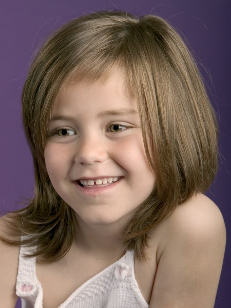 Modern haircut with layers for little girls