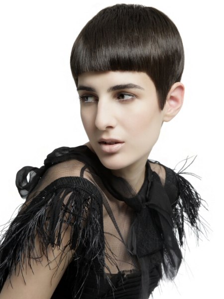 Boyish short hairstyle with pointy sideburns for women