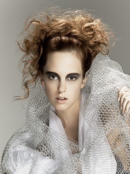 Updo with high-piled Medusa curls