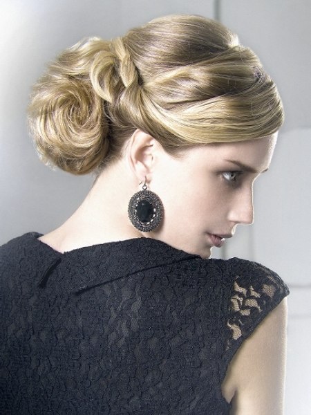 Blonde updo with the hair tugged under