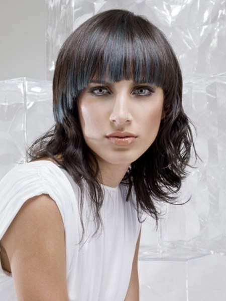 Dark hair with a blue color effect width=