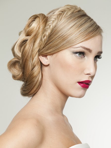 Updo with a herringbone braid and an elongated bun