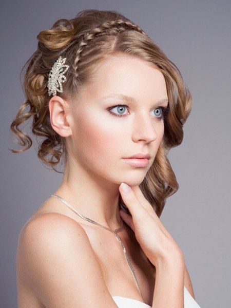 Updo with a French braid for a fairy tale hairstyle