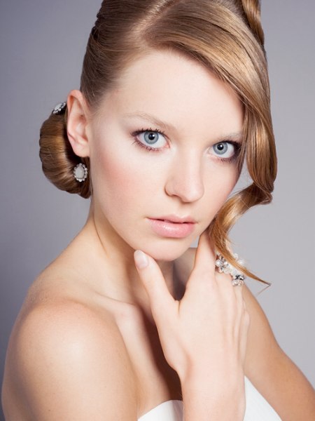 Hair in an updo with chignon for a ball