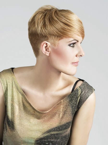 Very short women's hair with clipper cut layers