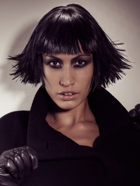 Sleek bob hair cut with flared up sides