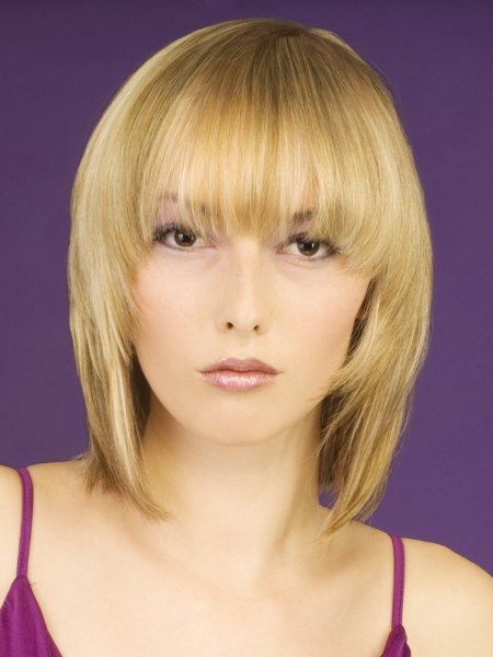 Medium length hair with blonde highlight