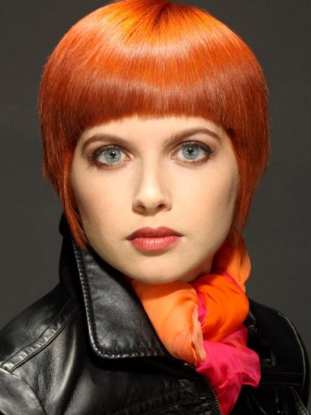 Short orange hair styled sleek